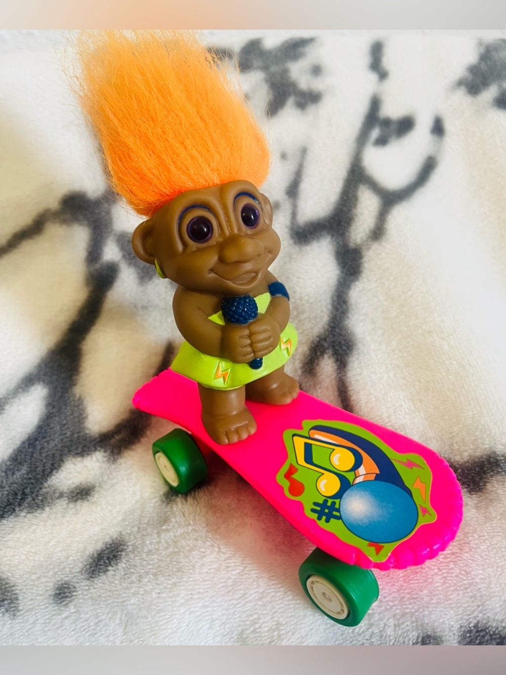 1992 Rockin N’ Roll Troll with Neon Orange Hair on a Hot Pink WindUp Skateboard
